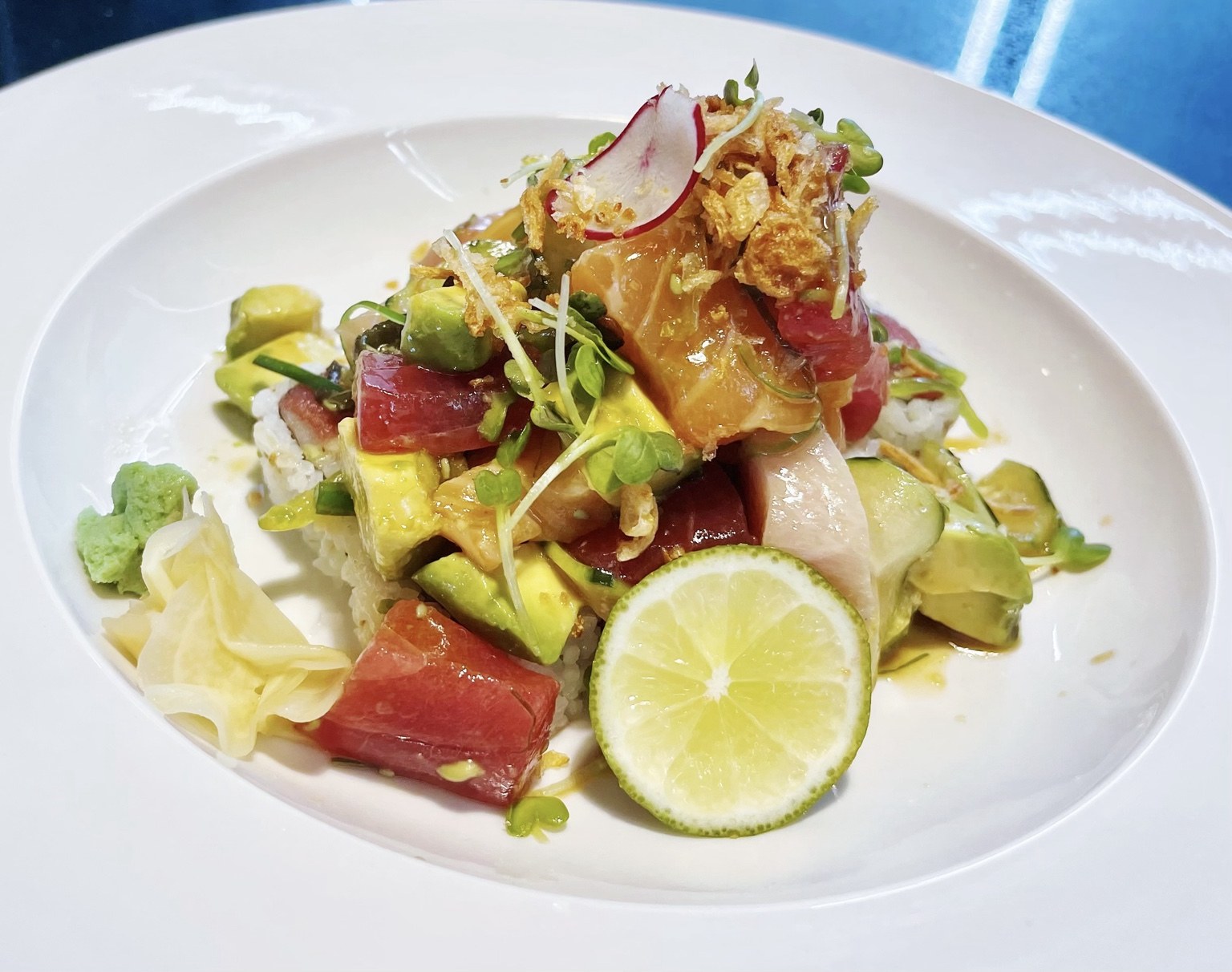 Fresh Japanese bowl with seafood and avocado