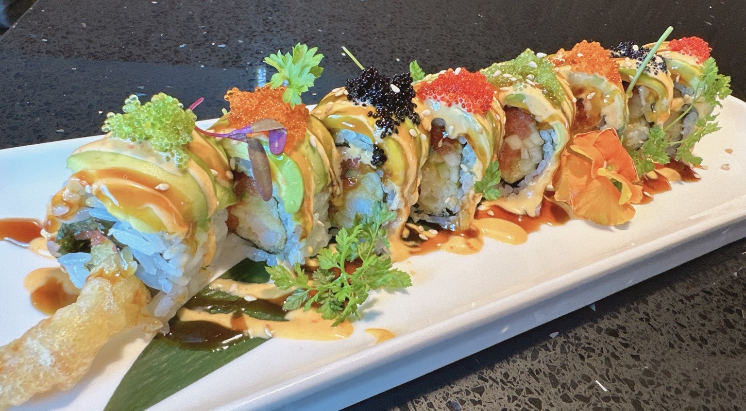 Colorful chef-crafted sushi roll